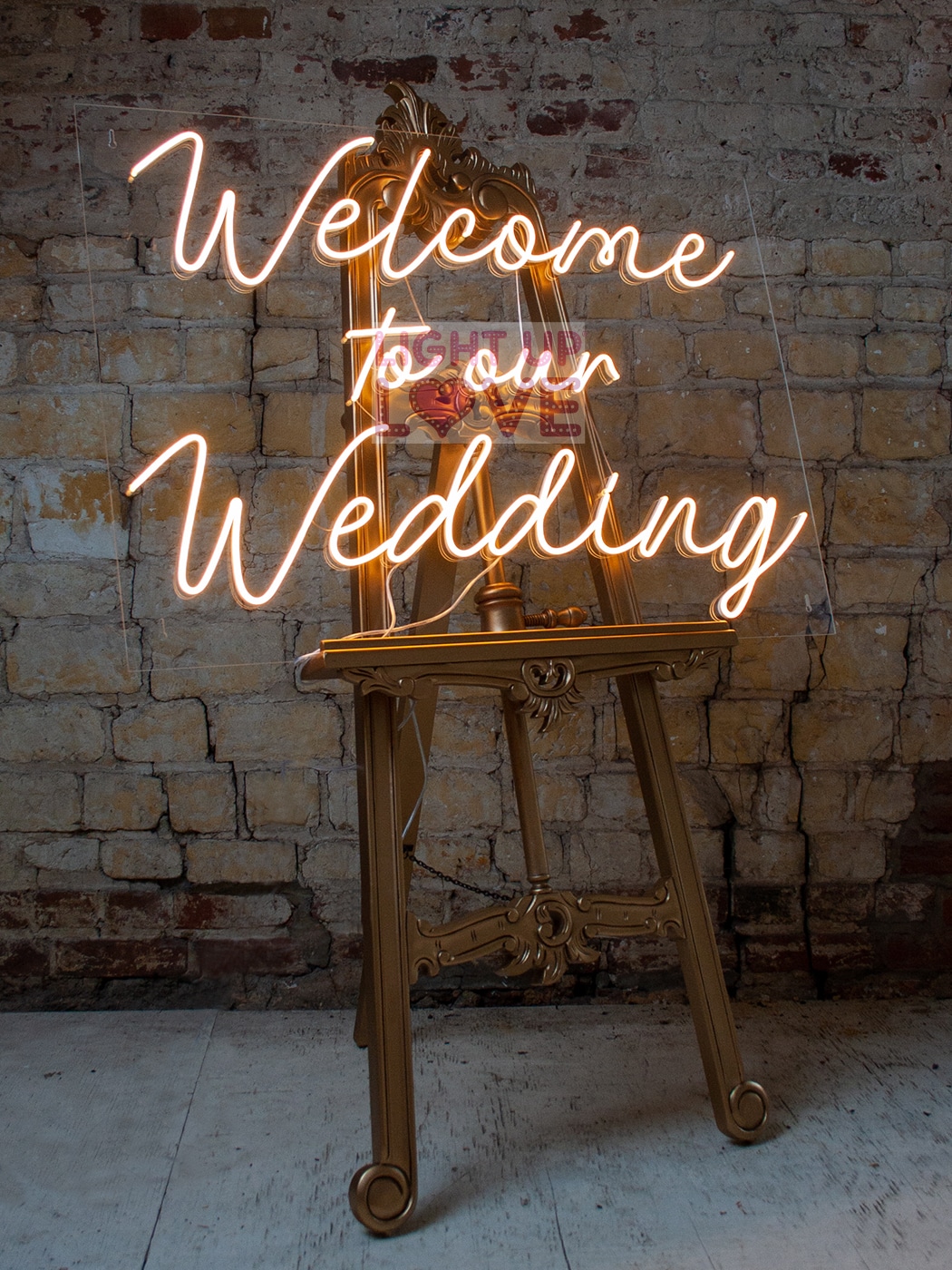 Welcome to our Wedding Neon sign on Gold Easel