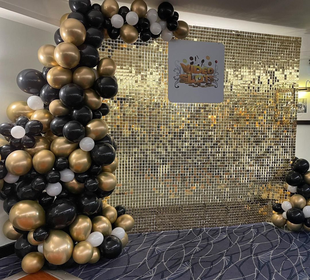 Corporate Gold Sequin Wall with Balloons at The Savoy